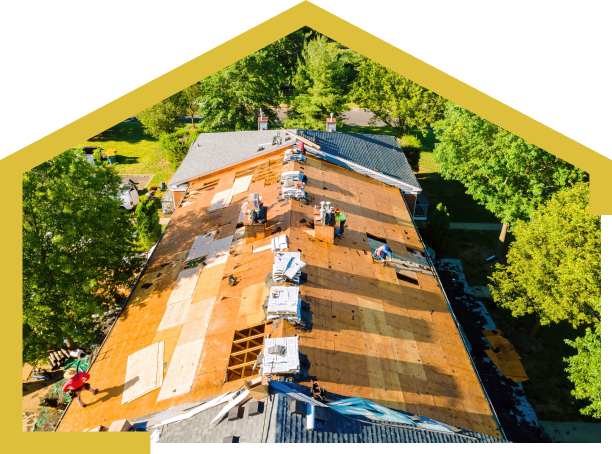 Aerial view of a house with roof under construction. Builders are installing new roof