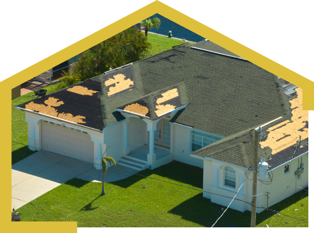 A house with a roof that has visible damage